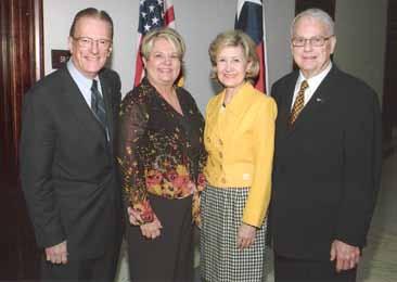 visits with Texas legislators including U. S. Representatives Michael C.