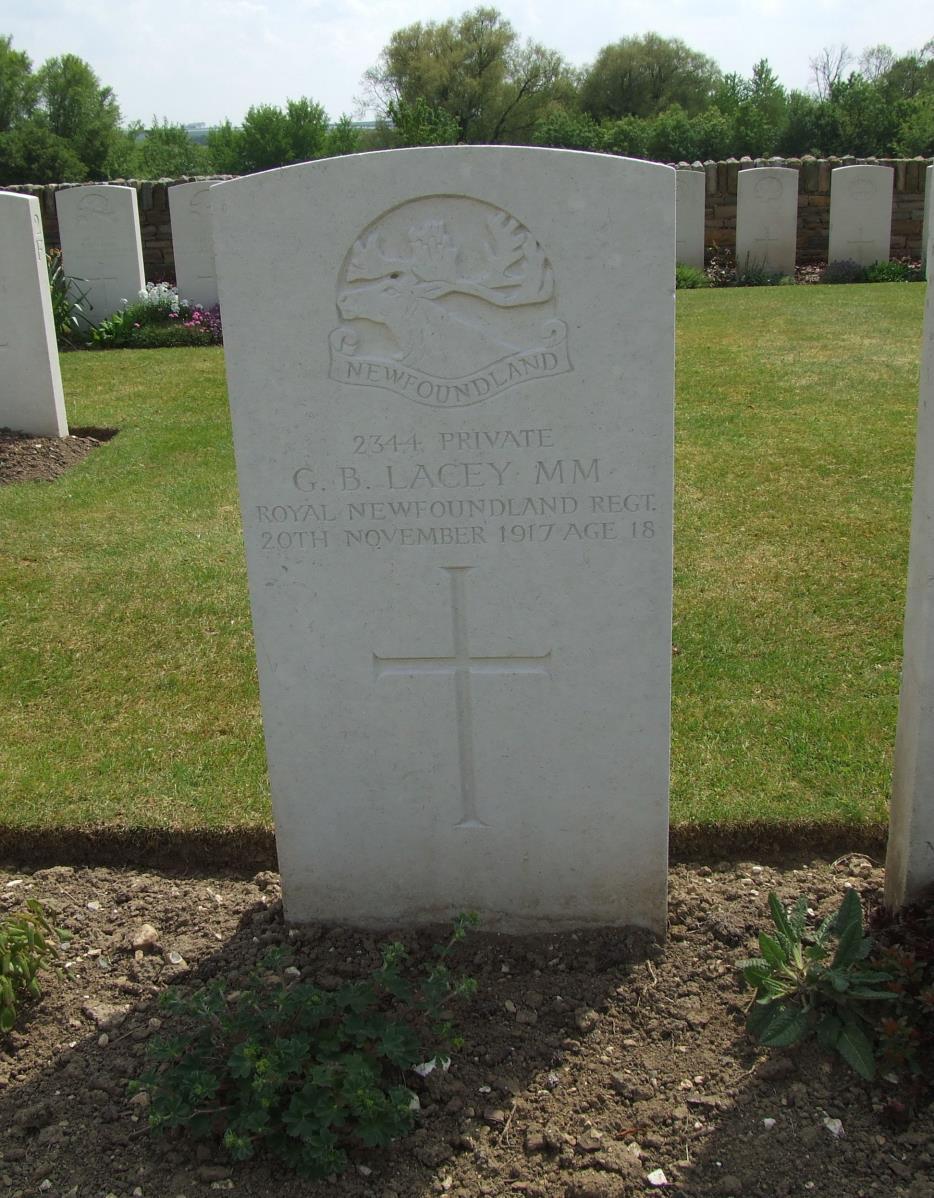 Private George Bertram Lacey MM (Regimental Number 2344) lies in Marcoing British Cemetery Grave reference II. E.