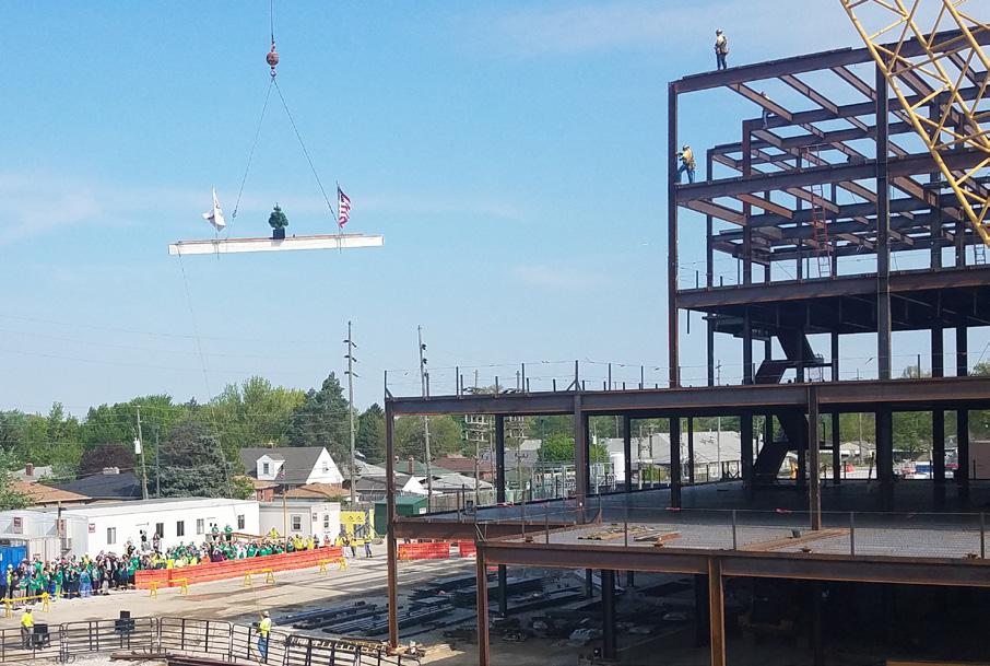 2 LAST BEAM IN PLACE FOR THE NEW COMMUNITY EAST The construction project at East reached a significant milestone last month with the placement of the last beam atop the new patient tower.