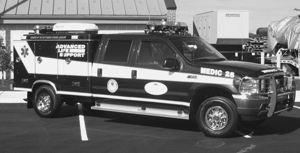 MEDIC 28 S 2003 FORD F-350 Placed into service at a cost of $75,000 the 2003 features an extended four door passenger cab allowing for the comfortable rear seating of paramedic