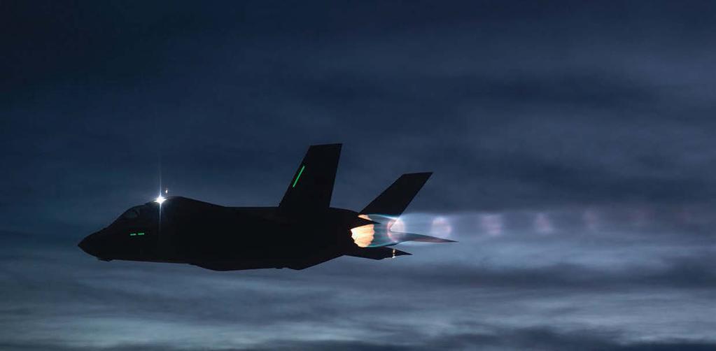 1 2 3 1 An F-35A accelerates into the night sky in full afterburner, showing the power