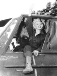 Monroe waves to troops from