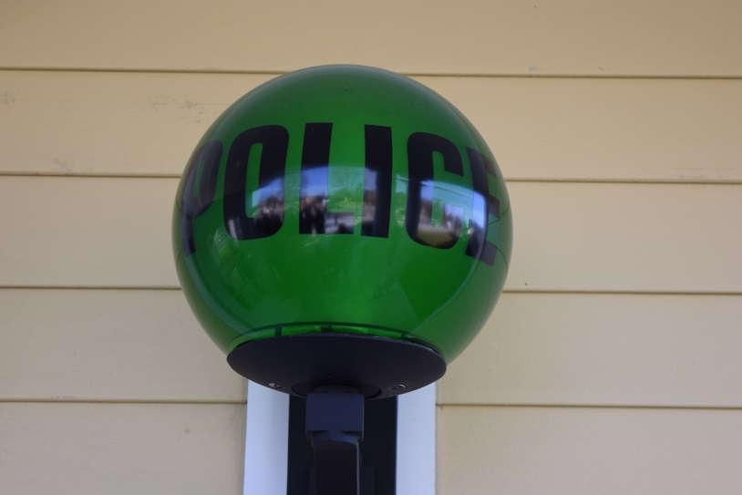 The lighted green globes in front of the