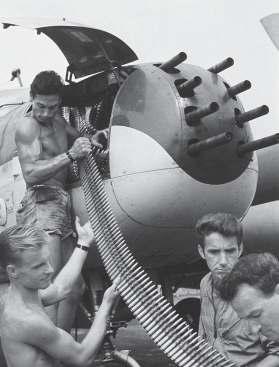 Congo, 1964 65: former members of the Liberation Air Force photographed while loading nose-gun ammunition into a B-26B of the CIA-backed mercenary air force that flew from Katanga in support of Prime