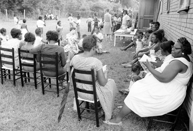 VOL. 52, NO. 1 (FALL 2014) 61 Local residents, freedom school students, and volunteers celebrate the opening of the Palmers Crossing Community Center in Hattiesburg, Mississippi, on 18 July 1964.