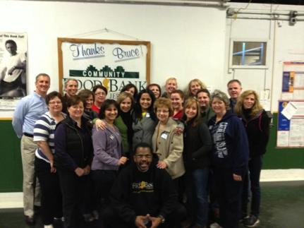 Twenty employees from Global Compliance held a volunteer activity at the Community Food Bank of New Jersey to sort and package food for its various feeding programs.