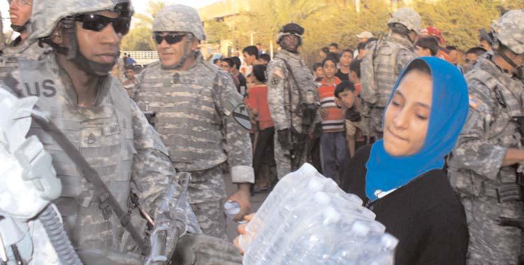 Headquarters Company, 1st Battalion, 64th Armor Regiment, 2nd Brigade Combat Team, 3rd Infantry Division, and physicians and pharmacists with the Iraqi Army treated more than 300 area residents for