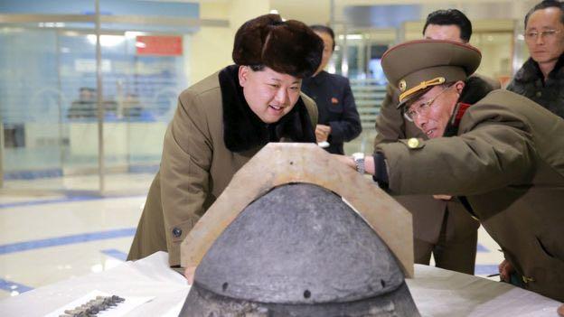 Image copyright REUTERS Image caption North Korean leader Kim Jong-un looks at a rocket warhead tip (undated image) North Korea is thought to have about 50 of them, the BBC's Korea correspondent,