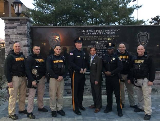 SHERIFF S OFFICERS HONORED FOR ASSISTING IN ARREST ON NEW YEARS EVE Sheriff s Officers Royston Hercules and Charles Welles along with six officers from the Long Branch Police