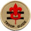 Troop Guide Job Description: The troop guide works with new Scouts. He helps them feel comfortable and earn their First Class rank in their first year.