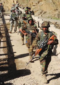 Afghan National Army (ANA) soldiers and paratroopers cross the Gowerdesh Bridge during Operation Mountain Highway II in Nuristan Province, Afghanistan. The ANA, Afghan Border Patrol, U.S.