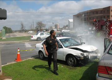 enact a mock crash to alert students of the dangers of driving under the influence. & distracted driving.