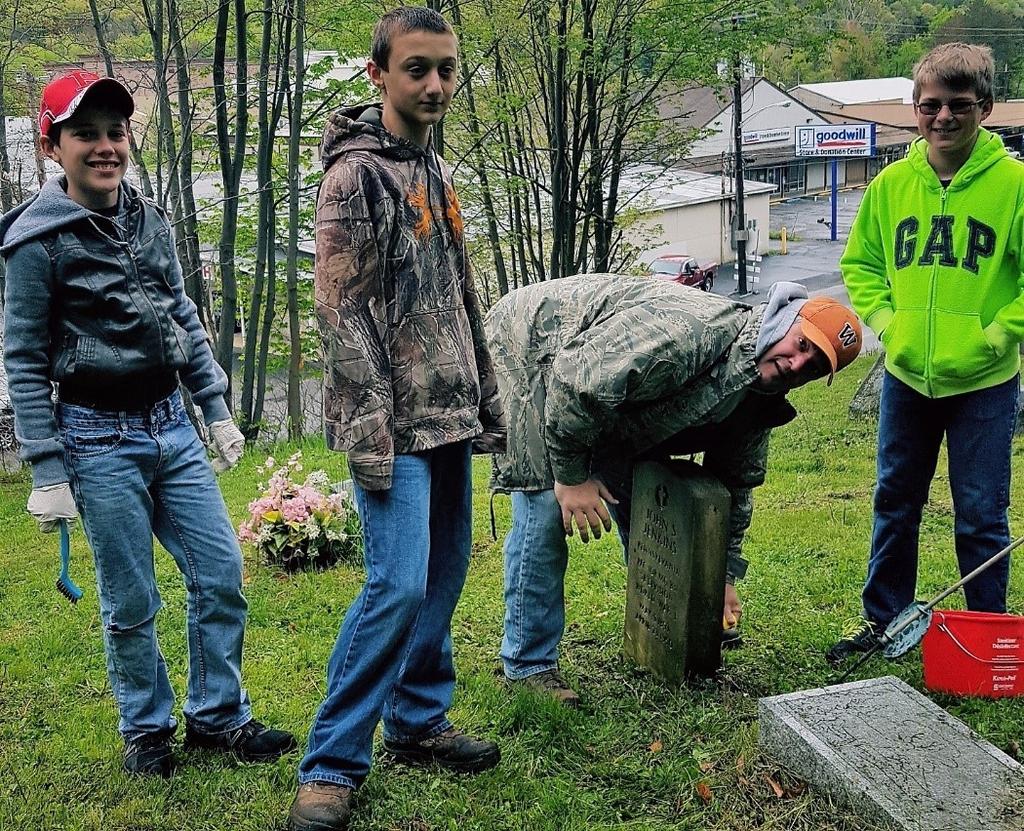 Boy Scout Troop 536 Scoutmaster Mike Delp, a Pa. State Trooper, used the Potter County Gravestone Restoration Project as a lesson in patriotism and community service.