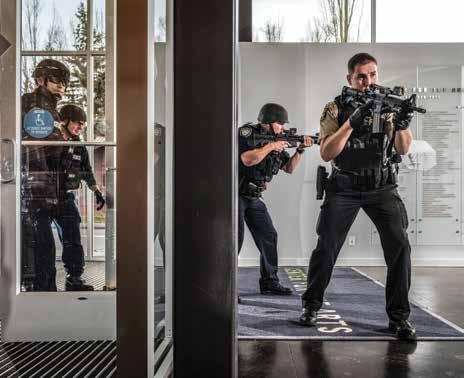 MISSION SUCCESS Armed police officers provide protection for tactical EMS providers as part of a rescue task force. Photo David Bowers slightly expanded patient population.