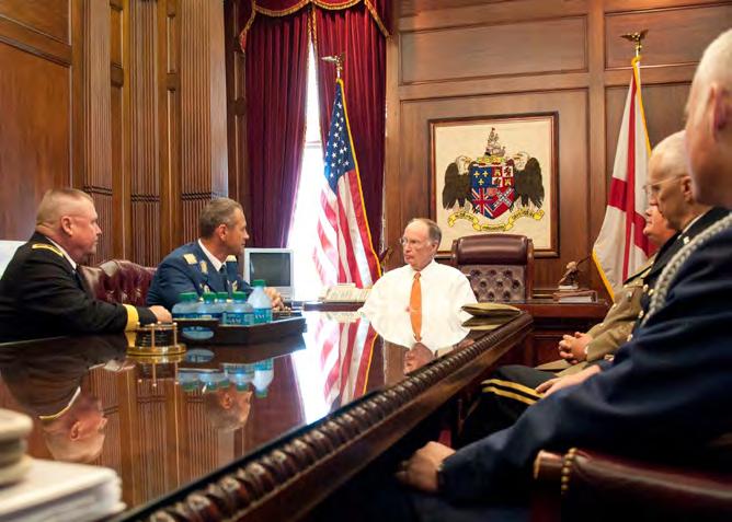 The Romainian Chief of Defense, alongside Adjutant General Maj. Gen. Smith, visits Governor Bentley in his office in Montgomery, Ala. (Photo by Sgt.