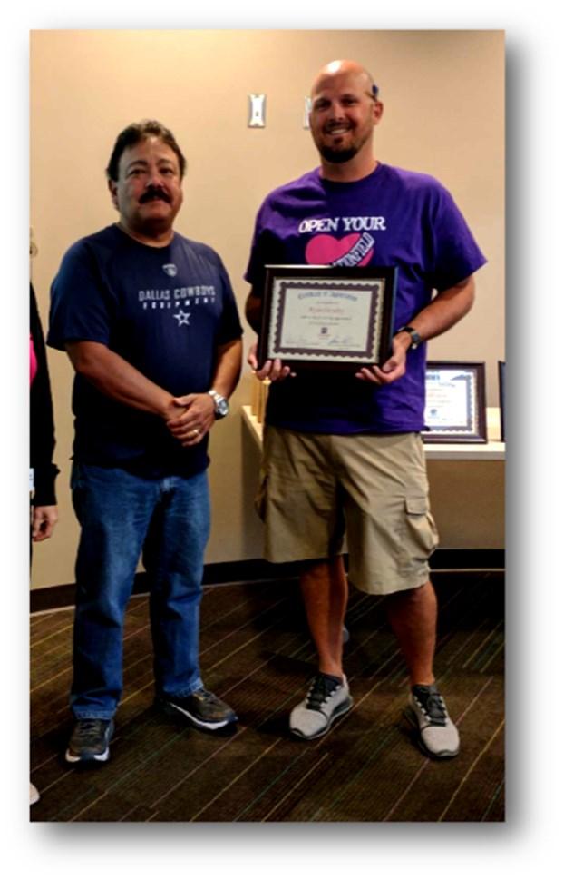 InspirationField Recognizes Ryan Denahy for 10 Years of Service! Ryan Denahy, Adult Services Director, was recently recognized for his 10 years of employment at InspirationField s All Staff Training.