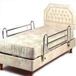 50) Chrome side rails, telescopic to full length of bed, cross bars adjust from single to double beds. Moulded clamps rotate when lowering / raising side rails. These should always have bumpers.