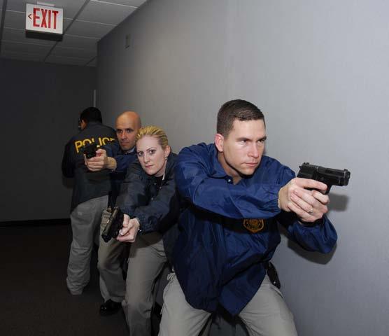 U.S. Army/Navy U.S. Army Criminal Investigation Command special agents conduct raid operations.