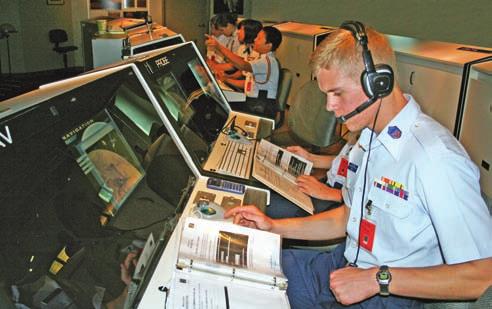 In the Basic Communications Course at the National Emergency Services Academy, Cruz-Colon practiced radio repairs that can be made in the field.