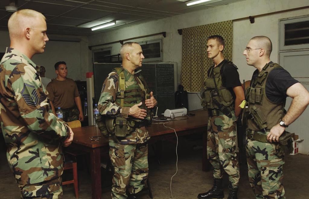 E X P E R T K N O W L E D G E I N A J T F H E A D Q U A R T E R S Joint Task Force Liberia commander speaking to Air Force security forces in Senegal, September 2003 52 d Communications Squadron