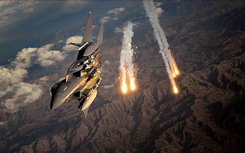 Section 3: PBB An F-15E Strike Eagle deploys countermeasure flares over Afghanistan operations in a permissive, irregular warfare environment require new capabilities, such as longer aircraft dwell