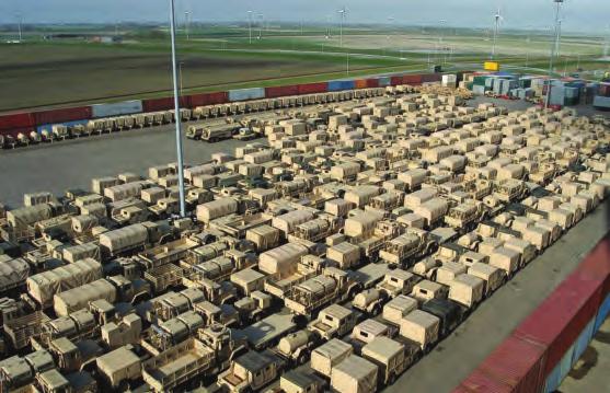 Hundreds of combat-ready vehicles await loading aboard a large, medium-speed roll-on/roll-off ship en route to SWA. The vehicles will enable Army power projection and expeditionary operations. (U.S. Army photo by Charles W.