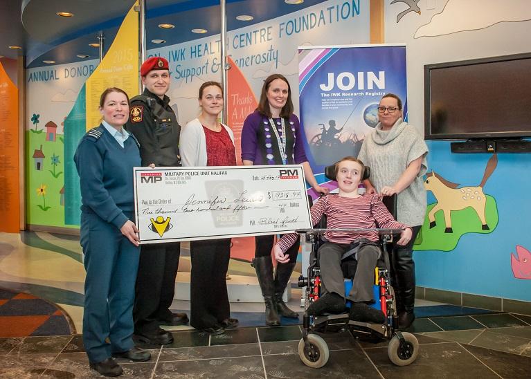 MILITARY POLICE DONATION A BIG HELP FOR LOCAL TEEN WITH CEREBRAL PALSY By Ryan Melanson Reprinted with permission of Trident publications, CFB Halifax A young girl from the Truro area and her family