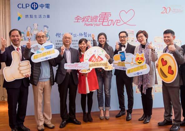 Photo 3 The three families participating in Power Your Love programme share energy saving tips with Under Secretary for the Environment Mr Tse Chin-wan (third left),