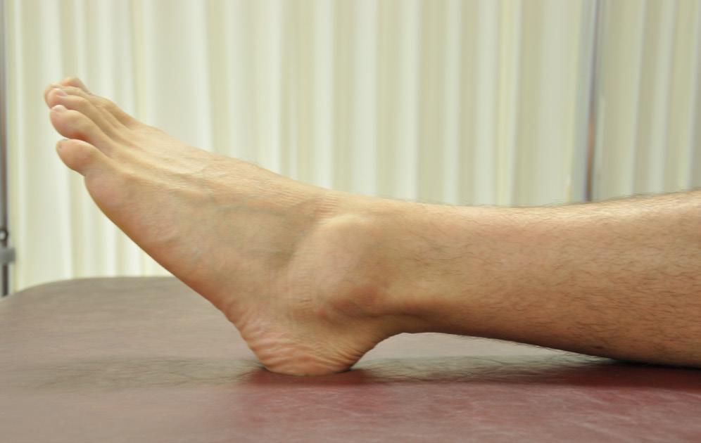 Slide heel along surface, bending knee toward chest.
