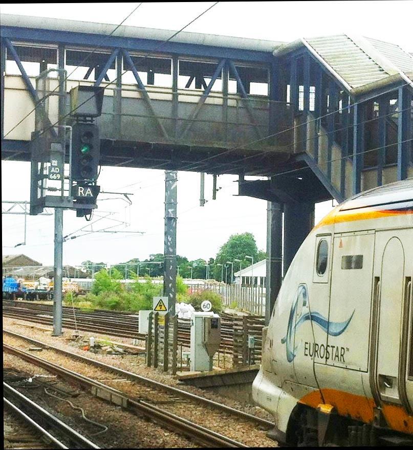 Figure 1.5 Eurostar train in platform 4 at Ashford International at one of the 12 signals (AD 669) where this project will deliver KVB to upgrade the existing signalling system.