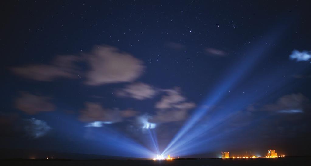 The United Launch Alliance Atlas V rocket with NASA's OSIRIS-REx spacecraft on board is seen illuminated in the distance on Wednesday, Sept. 7, 2016 at Cape Canaveral, Florida.