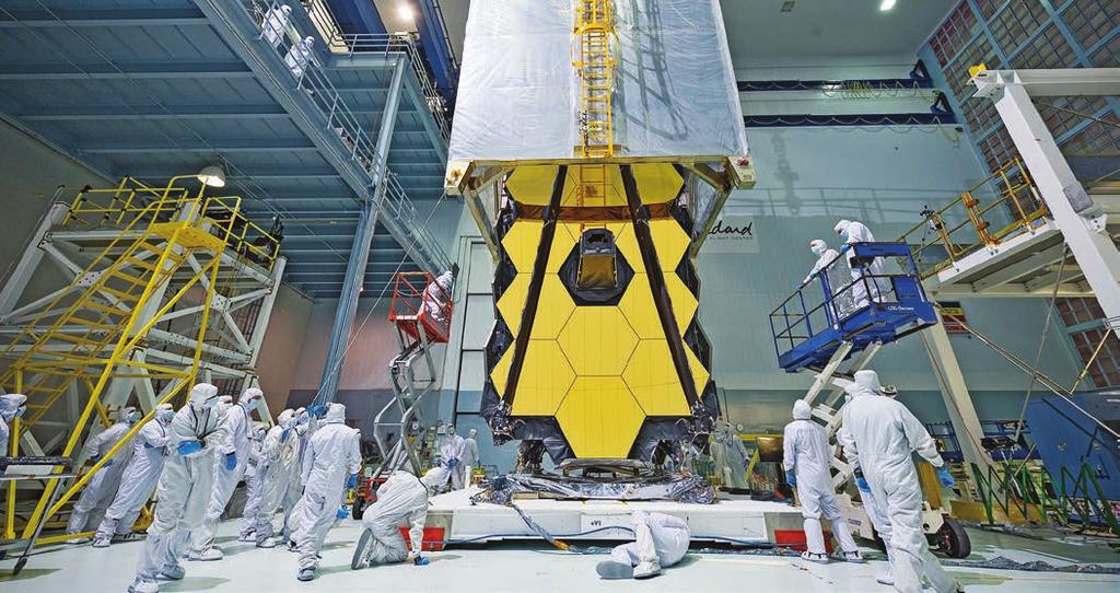 A clean tent protects the James Webb Space Telescope while engineers at NASA's Goddard Space Flight Center transport it out of the relatively dust-free cleanroom and into the shirtsleeve environment