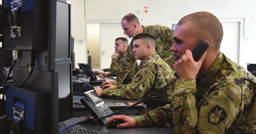 Soldiers of Company C, 53rd Signal Battalion man the Wideband Satellite Communications Operations Center in Landstuhl, Germany.