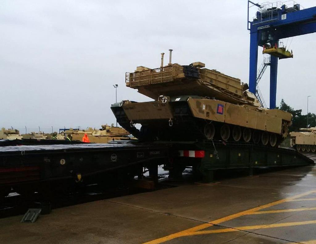 Figure 1. An M1 Abrams tank preps for rail haul Sept. 14, 2017, out of the port of Gdanks, Poland. The first vessel of three arrived at Gdanks to kick off the mission in Europe.
