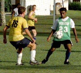 Sports International soccer tourney comes to Kwajalein By Jim Bennett Editor (Photo by Jim Bennett) Kobeer s Scott Hill and a Majuro All-Star collide going for the ball Saturday at Brandon Field.