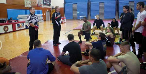 The referees used the International Federation of Associated Wrestling Styles as their rulebook and guide to supervise and score the tournament, which was sponsored by Marine Corps Community Services.