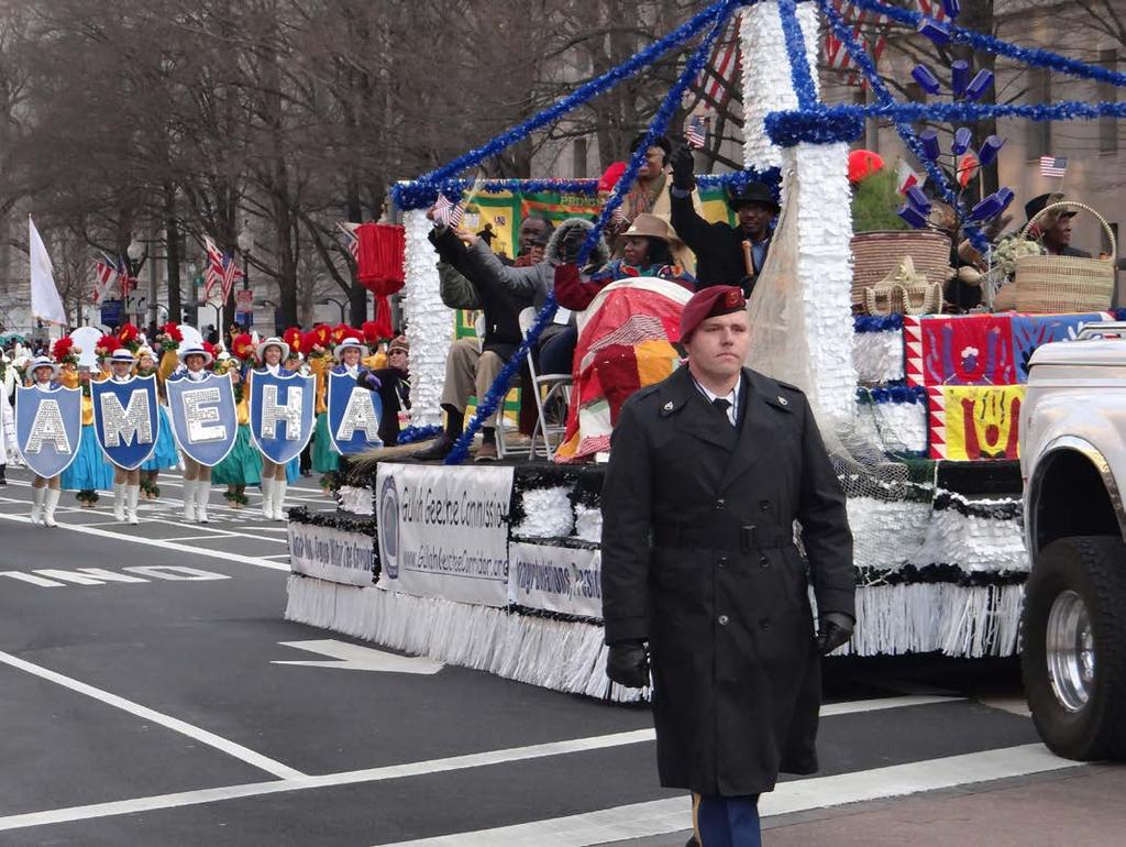A paratrooper from the 1st Battalion, 319th Field Artillery Regiment, remains with the parade marchers from their arrival at the assembly area until the end of the 2013 presidential inaugural parade.