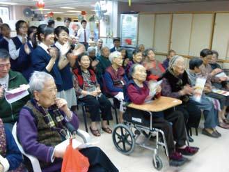 Students are playing games to share happiness with elders.