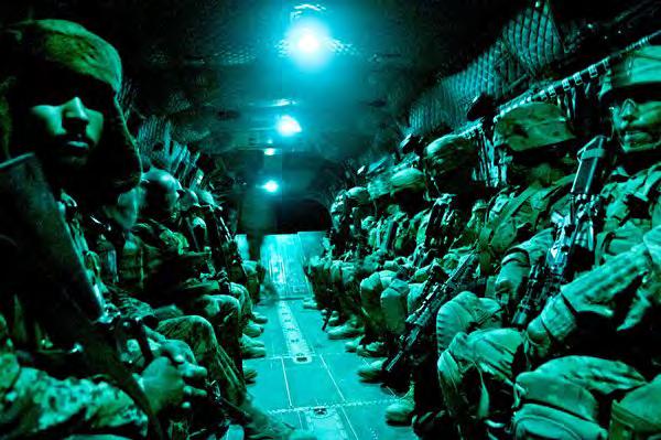 The ride to a raid can be tense. In this Chinook, U.S.