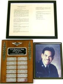 40 a-c Wayne Ching Memorial Scholarship items -framed documentation of establishment -rectangular wooden award; wings and floral embellishment; several engraved silver