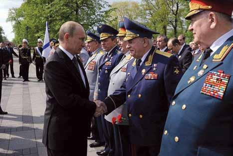 Presidential Press Service President Putin greets military veterans in a ceremony at the Tomb of the Unknown Soldier in Moscow on May 8.