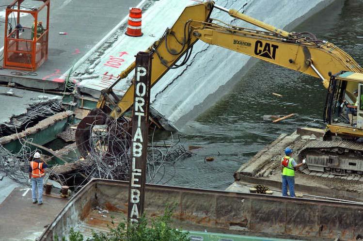 Bridge Demolition and Removal Steel removed from river