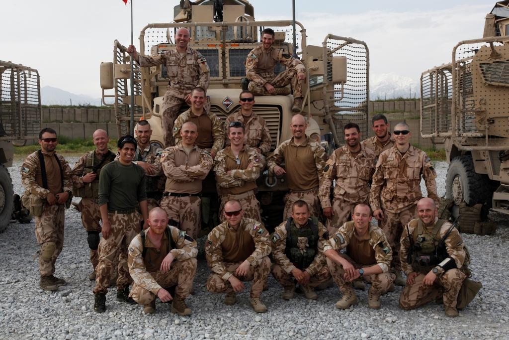 On Patrol With the Czech Republic Soldiers Army of the Czech Republic soldiers with the 1st Mechanized Company, 41st Battalion, 4th Rapid Deployment Brigade, pose for a group photo at an Afghan
