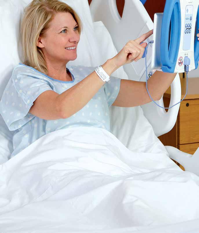 DEVICE STORAGE AREA holds patient's personal items, including devices and reading material.