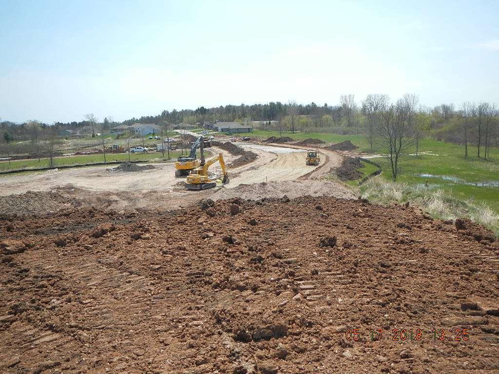 Sandy Bay Highlands Conservation Subdivision, Phase 2 Kruczek Construction has completed its work, installing water, sanitary and storm sewer utilities and grading and gravelling street extensions