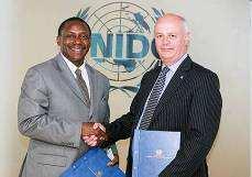 K. Yumkella, Director-General, UNIDO Rob Steele, Secretary-General of ISO MoU signed on 23 June 2009 in Vienna Andrew J. Wallard, Director BIPM, Kandeh K.