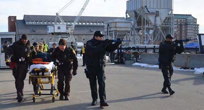 Photo courtesy Boston EMS Boston EMS active shooter response training with the Boston Police Department SWAT team, U.S. Navy and National Park Service Police at the USS Constitution in Charlestown, Mass.
