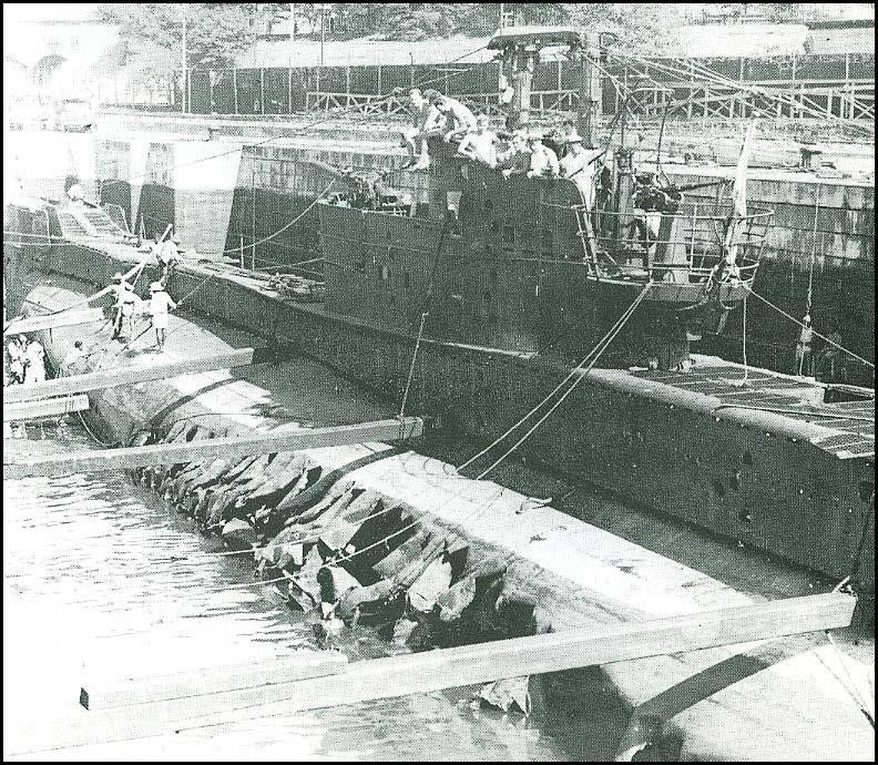 GROUPS AND SINGLE DECORATIONS FOR GALLANTRY The damaged ballast tanks of Tally-Ho after her encounter with a Japanese torpedo boat - like crackling on pork 15 February 1944: torpedoes and sinks the