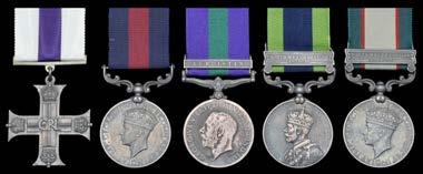 group of three awarded to Subadar Ghulam Mohammad, 127th Baluchis INDIAN ORDER OF MERIT, Military Division, 2nd type, 2nd Class, Reward of Valor, silver and enamel, reverse with central nut fitting