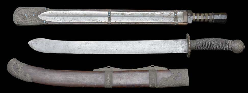 MILITARIA 244 A CHINESE SWORD AND A TIBETAN SWORD, the first with a 46.